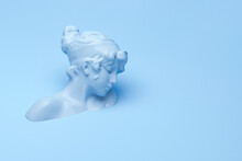 3D Rendering Of Female Bust Statue On Pastel Blue Background. Minimal Creative Futuristic Concept.
