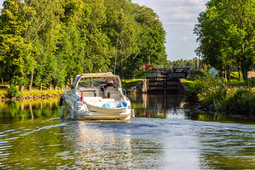 Wall Mural - Motorboat at Gota canal in Sweden