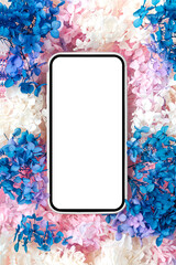 Wall Mural - smartphone mockup with pink and blue flowers. device screen mock up on stylish background for presen
