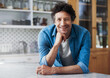 © Arnéll Koegelenberg/peopleimages.com - Happiness looks good on you. Portrait of a happy bachelor leaning on his kitchen counter.