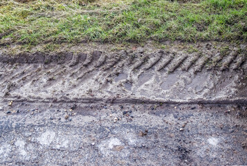 Wall Mural - Agricultural grounds and acre in high resolution showing tire tracks and cracks.