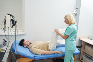 Young man on couch in neurologist office