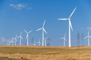 Wind turbines on autumn landsape