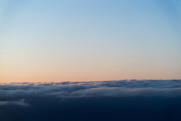 Wall Mural - looking at the sunset through airplane window