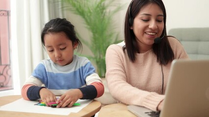 Wall Mural - Latin mother working on computer at home with her child - Busy family mom giving call center support