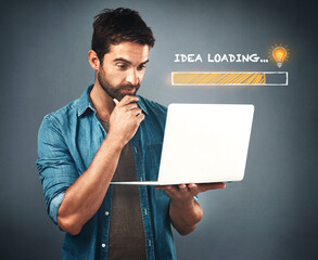 Poster - His idea is loading. Studio shot of a handsome young man looking thoughtful while working on his laptop beside an illustration of a loading bar against a grey background.
