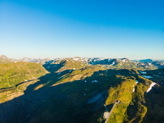 Canvas Print - Road with tunnel in mountains Norway. Aerial view.