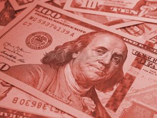 Wall Mural - american paper money. a $100 bill with focus on eyes of benjamin franklin. us banknotes close-up. sa