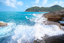 Scenic Views Of The Indian Ocean Washing Over The Rock Formations At Samui Island, Thailand.