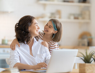 Sticker - mother with child working on the computer