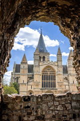 Wall Mural - View to Rochester Cathedral through castle wall window. Kent, England