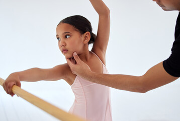 Canvas Print - Look this way. Closeup shot of a ballet teacher assisting a student with her position in a dance studio.