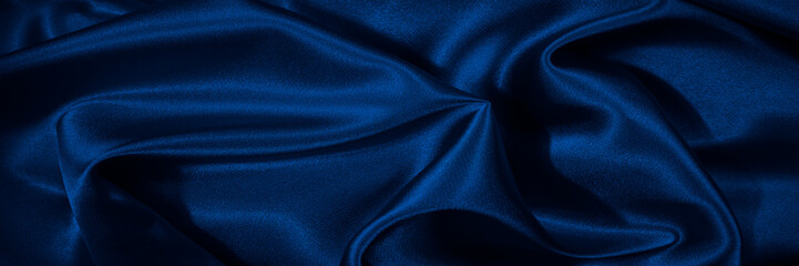 Wall Mural - Navy blue silk satin. Smooth silky shiny fabric. Dark luxury background for design. Christmas, New Year, festive, party. Web banner. Wide. Long. Panoramic.