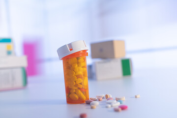 Poster - Colorful tablets with capsules and pills on blue background