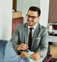 Wall Mural - business businessman office meeting entrepreneur man working  happy smiling communication discussion executive restaurant coffee shop businessmen businessperson two