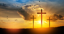 Christian Cross On Hill Outdoors At Sunrise. Resurrection Of Jesus. Concept Photo.