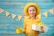 © Jacek - A young boy and decorations for Easter. Studio background.
