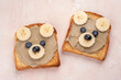 Funny children bear toasts with sunbutter or nuts butters for breakfast