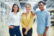 © Tasneem H/peopleimages.com - Teamwork is the secret ingredient. Portrait of a group of confident young businesspeople working together in a modern office.