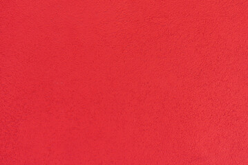 The walls are made of red cement plaster with a rough surface. For texture background images