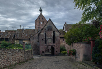 Canvas Print - Old stone houses and church in riquwhil