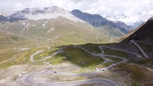 Stelvio Mountain Pass at South Tyrol, Italy - Aerial Drone View of the Famous Road with Curves and Hairpins - Giro d' Italia Cycling Lap