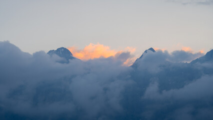 Poster - Beautiful shot of the First light on the mountain peak view