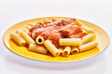 Poster -  Plate of italian rigatoni pasta with tomato sauce over white isolated background