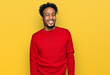 © Krakenimages.com - Young african american man with beard wearing casual winter sweater winking looking at the camera with sexy expression, cheerful and happy face.