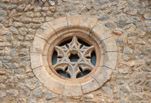Ancient Stone Cross Window On Church In Ibiza