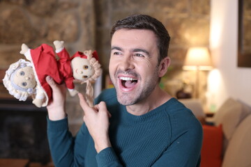 Man showing double ended little red riding hood doll