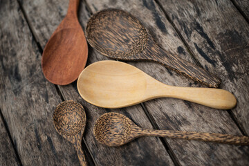 Wall Mural - spoon wood on wood table.