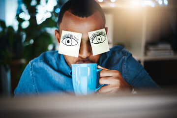 Poster - Caffeine, the supporting act of success. Shot of a young businessman working late at work with sticky notes covering his eyes and drinking coffee.