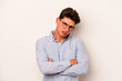 © Asier - Young caucasian man isolated on white background who is bored, fatigued and need a relax day.