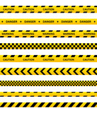 Fototapeta  - Yellow caution and danger ribbons and line tapes with black stripes for police, safety on construction, barrier. Vector. Attention, crime zone signs, banner. Security border and area