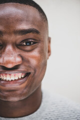 half face portrait smiling African american man