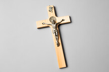 A Wooden Cross With Jesus Hanging. INRI. Isolated With Gray Background.