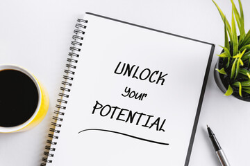 Wall Mural - Notebook With Inspirational Quote . Unlock Your Potential.
