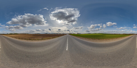 Wall Mural - 360 seamless hdri panorama view on asphalt road among fields in summer day with awesome clouds in bl