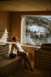 © BGStock72 - Young woman relaxing in the sauna