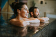 © BGStock72 - Young couple relaxing in a swimming pool