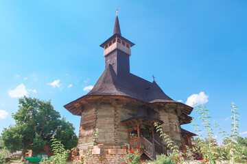 Old Orthodox Monastery Made by Wood . Church with wooden bell tower 