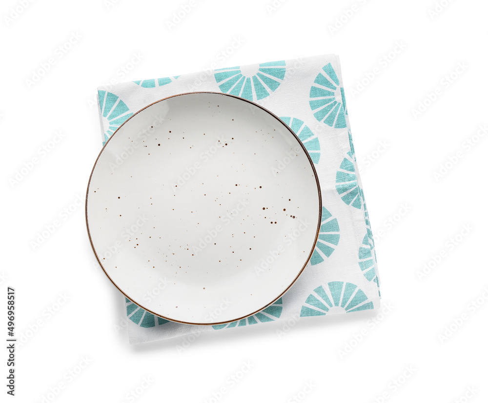 Plate with napkin on white background