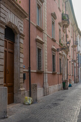 Poster - Narrow street in the old town of Ascoli Piceno in Italy