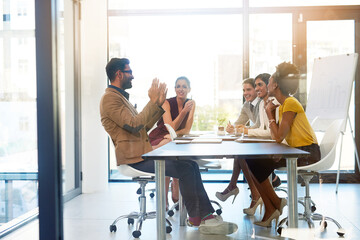 Aufkleber - Weve got some great ideas to merge together. Shot of a diverse group of businesspeople having a meeting in an office.