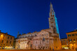 Sunset view of the Cathedral of Modena and Ghirlandina tower in Italy