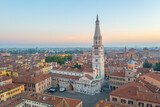 Fototapeta Na drzwi - Sunrise view of the Cathedral of Modena and Ghirlandina tower in Italy