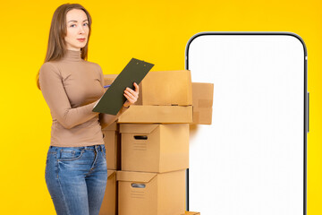 Poster - Small business owner. Woman is doing fulfillment. Business owner with cardboard boxes. Businesswoman with clipboard on yellow. Big phone white screen. Place for your proposal. Woman entrepreneur