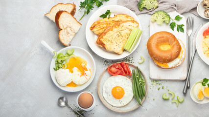 Wall Mural - Various ways of cooking chicken eggs on light background.