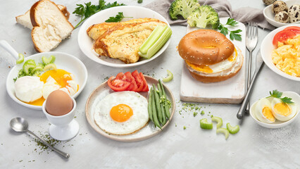 Wall Mural - Various ways of cooking chicken eggs on light background.